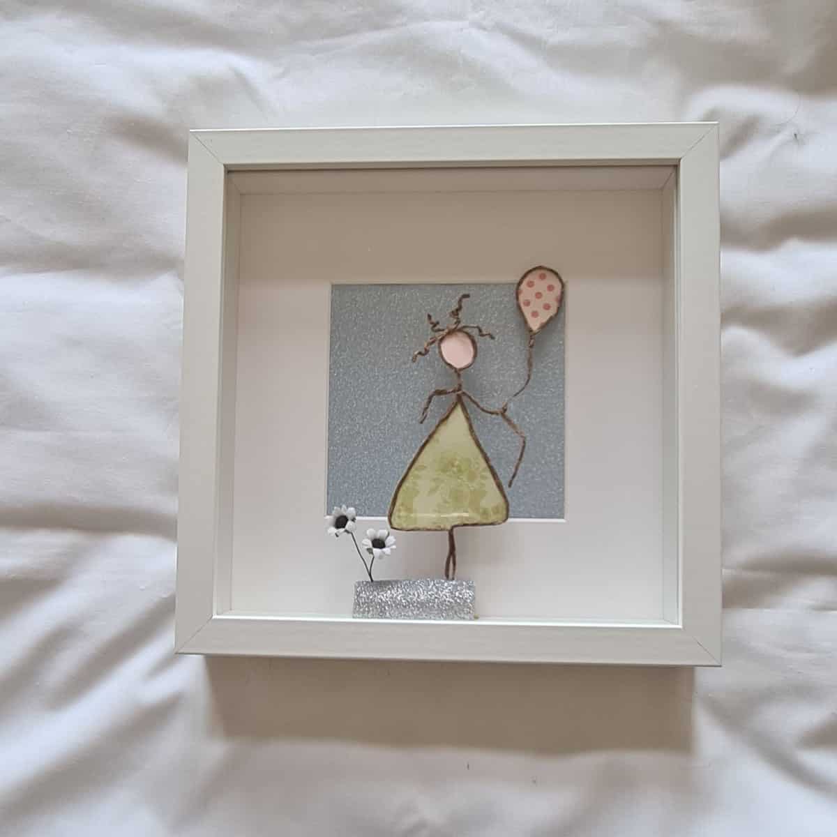 Wire Girl Holding Balloon Picture